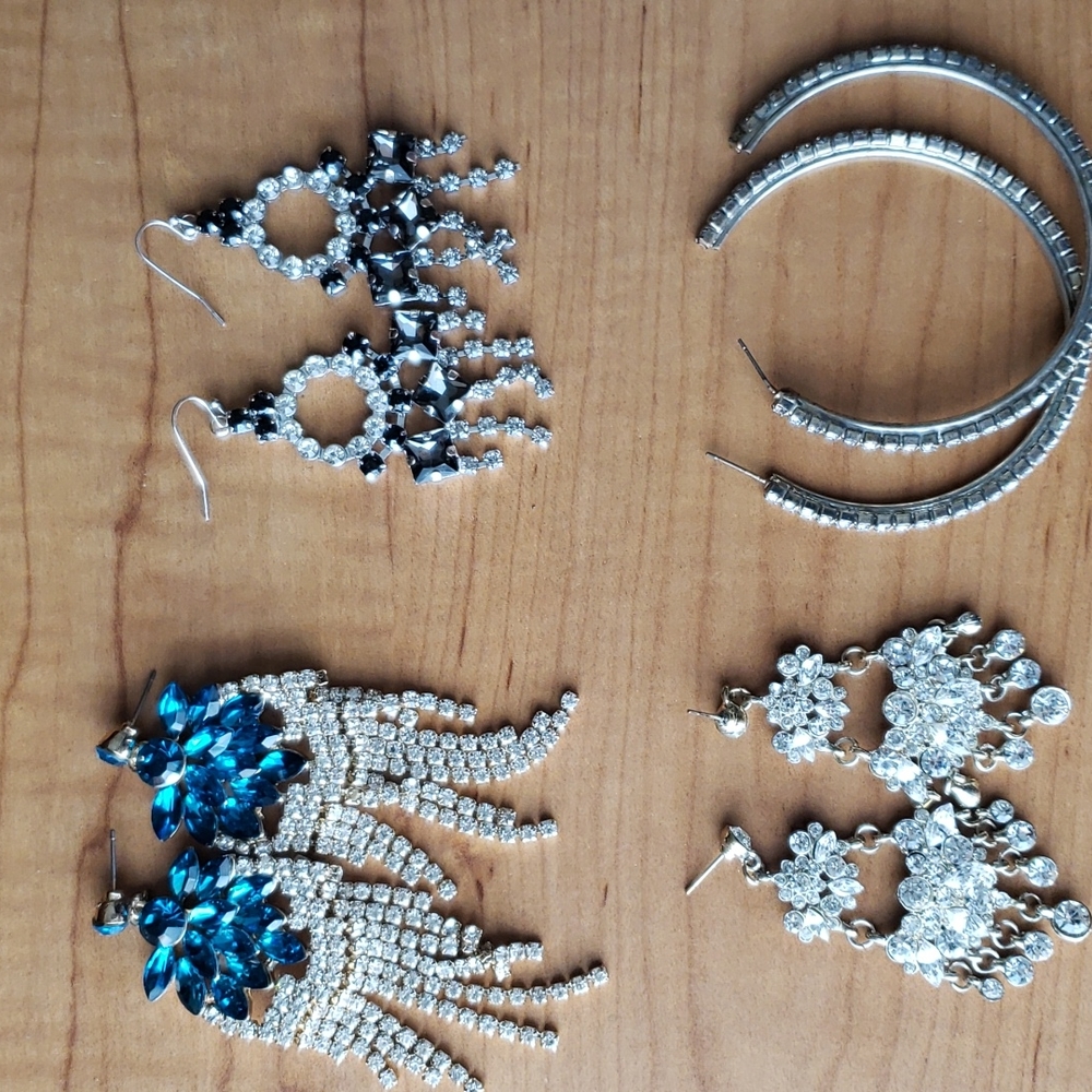 Lot of Costume Jewelry Earrings,Necklaces, Bracelets, Rings and a Brooch